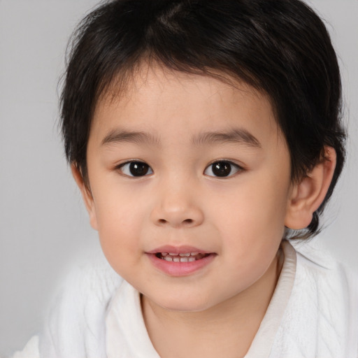 Joyful white child female with medium  brown hair and brown eyes