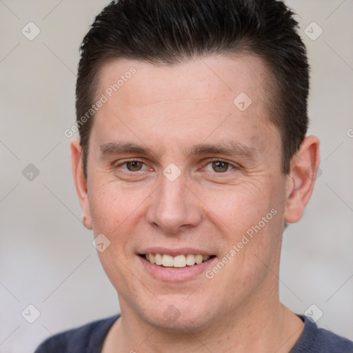 Joyful white young-adult male with short  brown hair and brown eyes