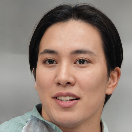 Joyful asian young-adult female with medium  brown hair and brown eyes