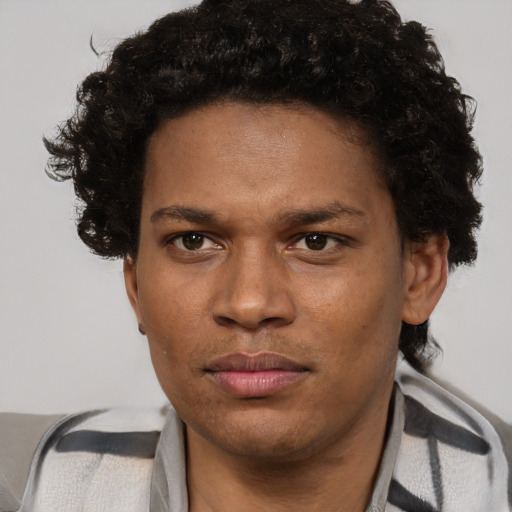 Neutral black young-adult male with short  brown hair and brown eyes