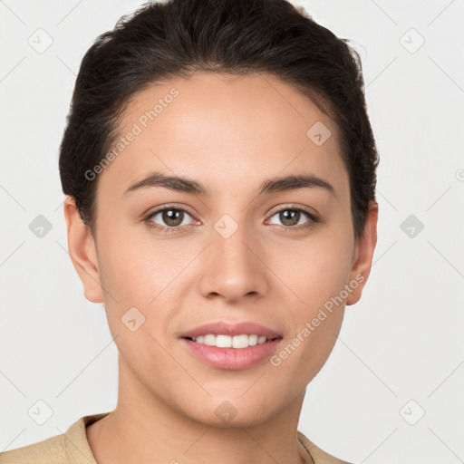 Joyful white young-adult female with short  brown hair and brown eyes