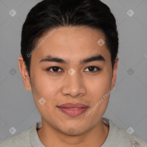 Joyful asian young-adult male with short  brown hair and brown eyes