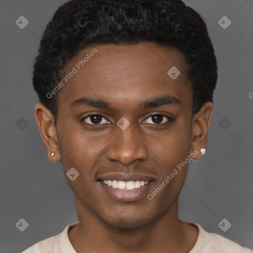 Joyful black young-adult male with short  brown hair and brown eyes