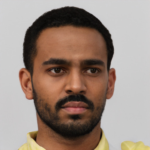 Neutral black young-adult male with short  black hair and brown eyes