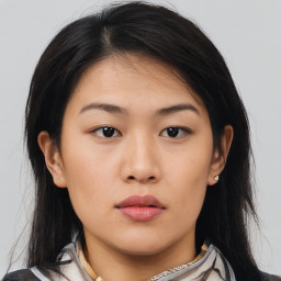 Neutral asian young-adult female with medium  brown hair and brown eyes