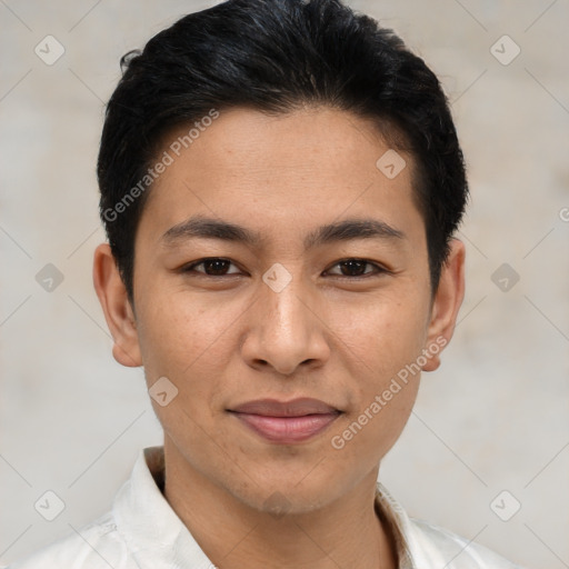 Joyful asian young-adult male with short  brown hair and brown eyes