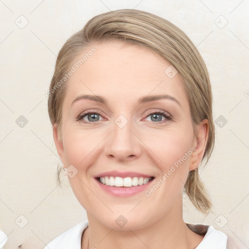 Joyful white young-adult female with medium  brown hair and blue eyes