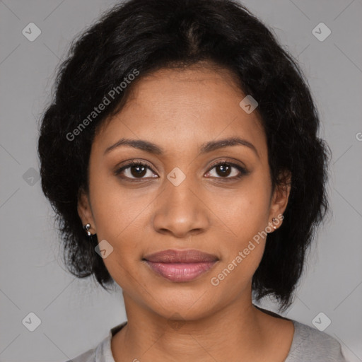 Joyful black young-adult female with medium  black hair and brown eyes