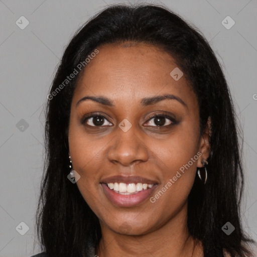 Joyful latino young-adult female with long  brown hair and brown eyes