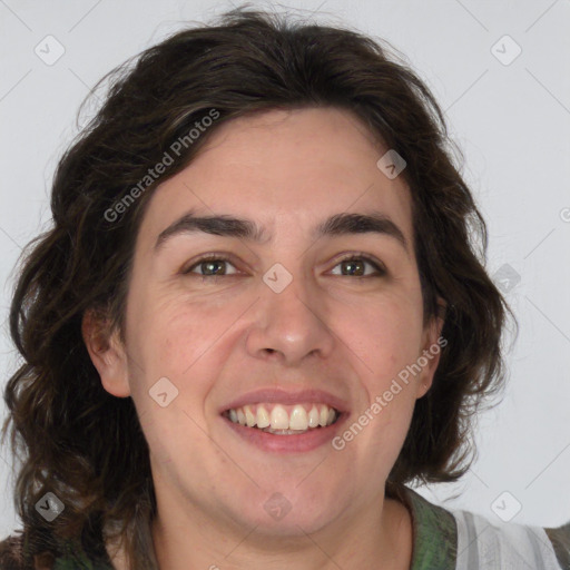 Joyful white adult male with medium  brown hair and brown eyes