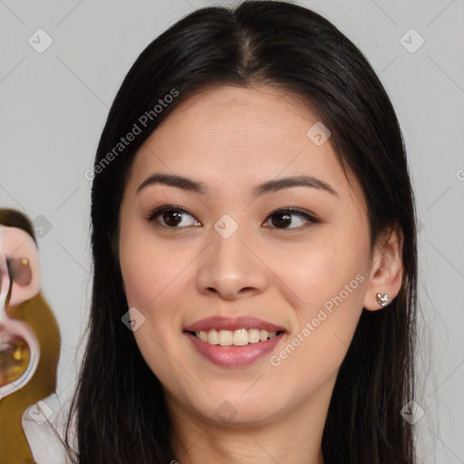 Joyful latino young-adult female with long  brown hair and brown eyes