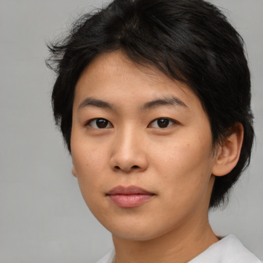 Neutral asian young-adult female with medium  brown hair and brown eyes