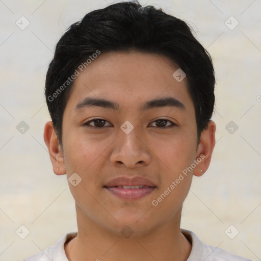 Joyful asian young-adult male with short  brown hair and brown eyes