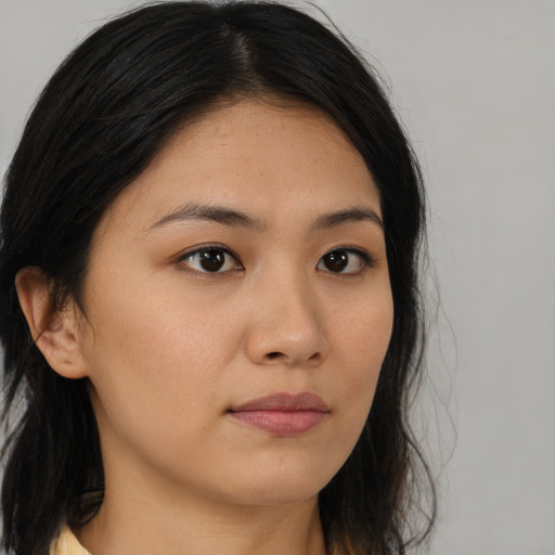 Neutral asian young-adult female with long  brown hair and brown eyes