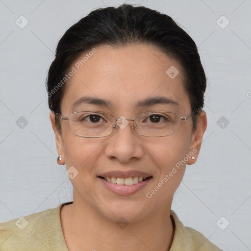 Joyful white adult female with short  brown hair and brown eyes