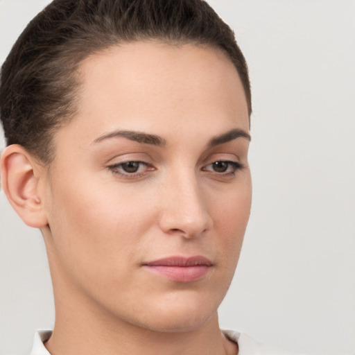 Neutral white young-adult female with short  brown hair and brown eyes