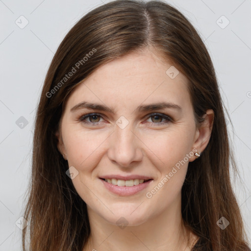 Joyful white young-adult female with long  brown hair and grey eyes