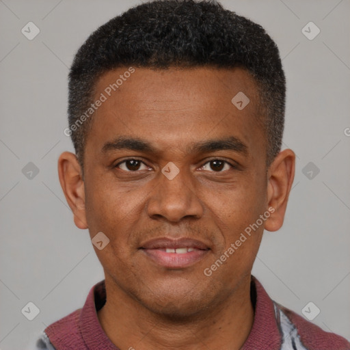 Joyful latino young-adult male with short  brown hair and brown eyes