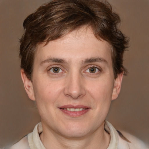 Joyful white young-adult male with medium  brown hair and brown eyes