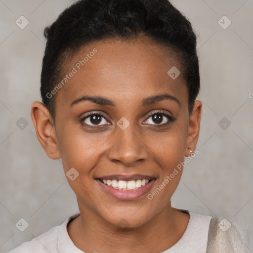 Joyful black young-adult female with short  brown hair and brown eyes