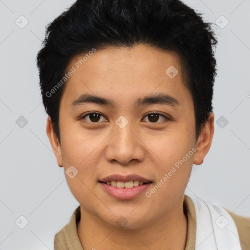 Joyful asian young-adult male with short  brown hair and brown eyes