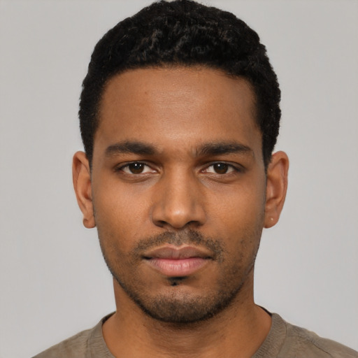 Neutral black young-adult male with short  black hair and brown eyes