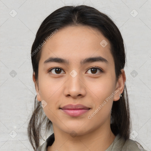 Joyful asian young-adult female with medium  brown hair and brown eyes