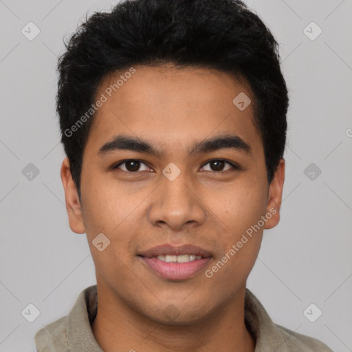 Joyful latino young-adult male with short  brown hair and brown eyes