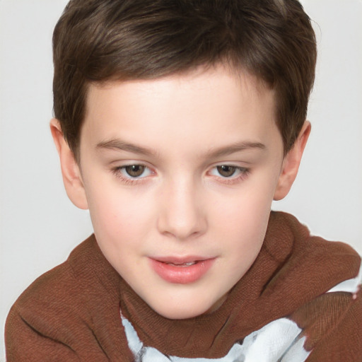 Joyful white child male with short  brown hair and brown eyes