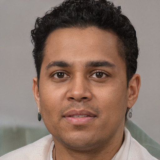 Neutral latino young-adult male with short  brown hair and brown eyes