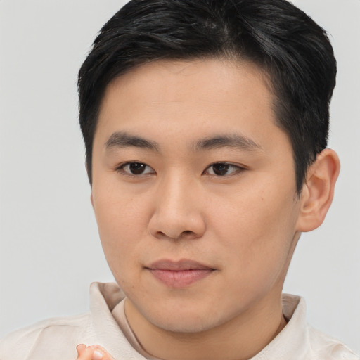 Neutral asian young-adult male with short  brown hair and brown eyes