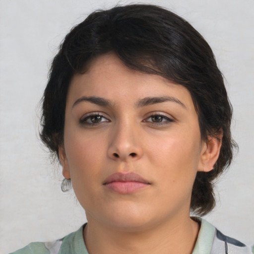 Neutral white young-adult female with medium  brown hair and brown eyes