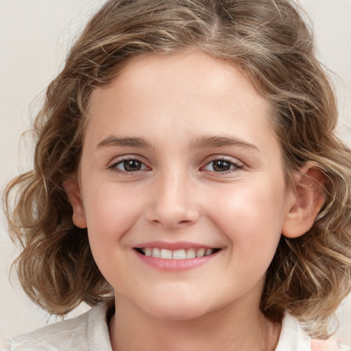 Joyful white child female with medium  brown hair and brown eyes