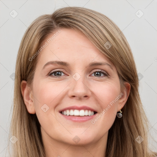 Joyful white young-adult female with long  brown hair and grey eyes