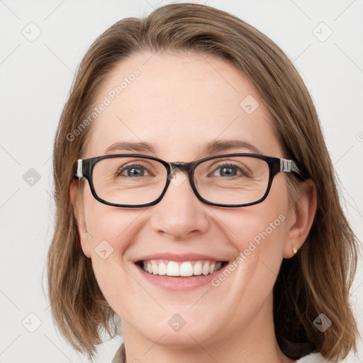 Joyful white young-adult female with medium  brown hair and blue eyes