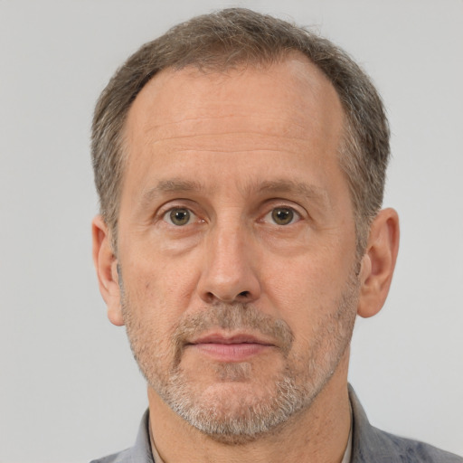 Neutral white middle-aged male with short  brown hair and brown eyes