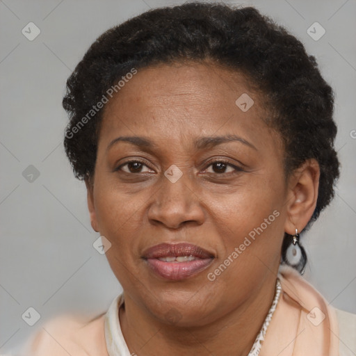 Joyful latino adult female with short  brown hair and brown eyes