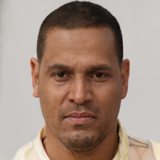 Neutral latino young-adult male with short  brown hair and brown eyes