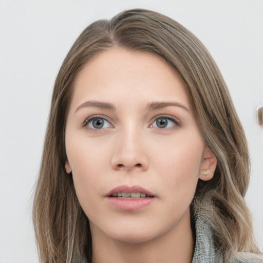 Neutral white young-adult female with long  brown hair and grey eyes