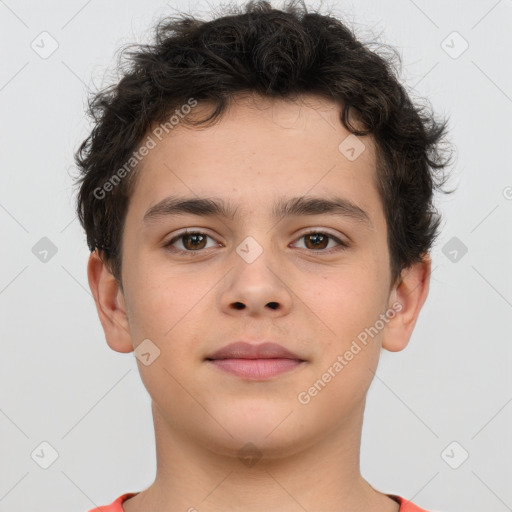 Joyful white child male with short  brown hair and brown eyes