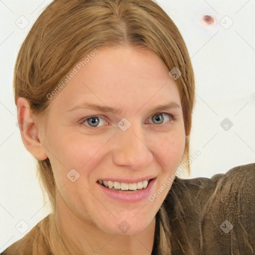 Joyful white young-adult female with long  brown hair and green eyes