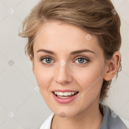 Joyful white young-adult female with medium  brown hair and blue eyes