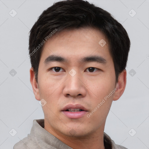 Neutral asian young-adult male with short  black hair and brown eyes