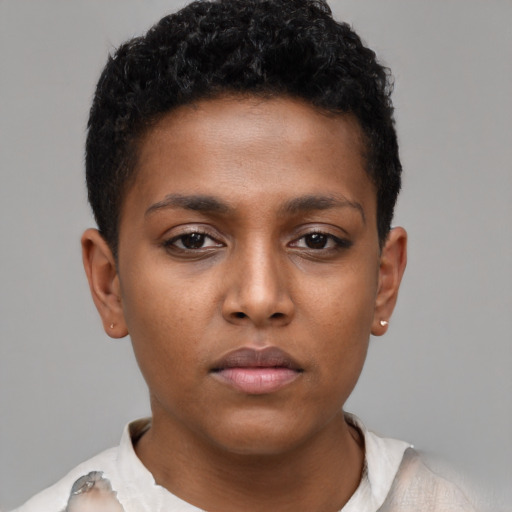 Neutral black child male with short  brown hair and brown eyes