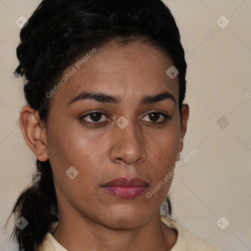 Joyful latino young-adult female with short  brown hair and brown eyes