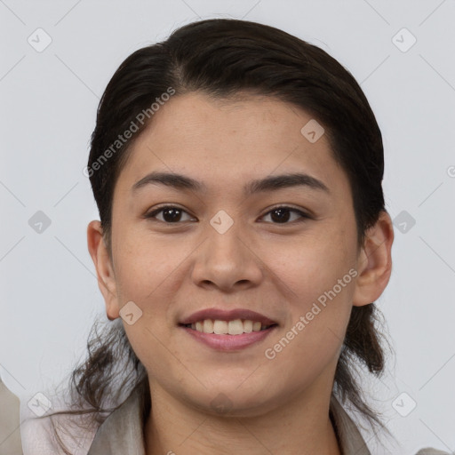 Joyful asian young-adult female with short  brown hair and brown eyes