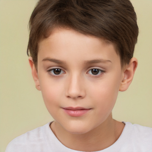 Joyful white child female with short  brown hair and brown eyes