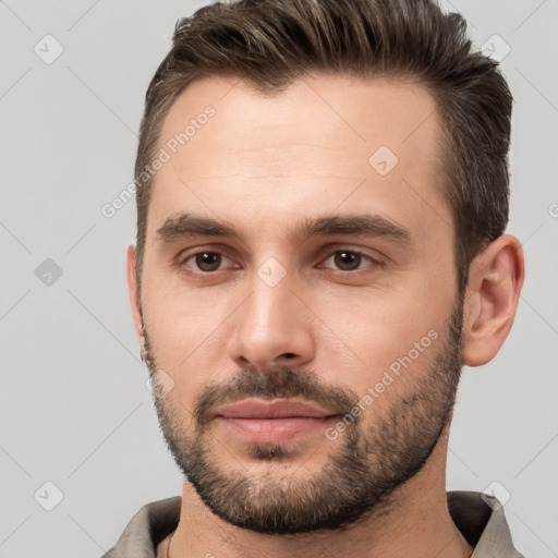 Neutral white young-adult male with short  brown hair and brown eyes