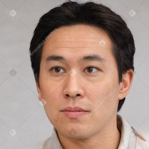 Neutral asian young-adult male with short  brown hair and brown eyes