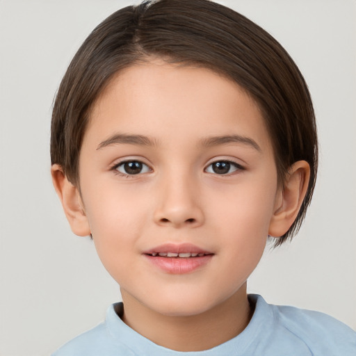 Joyful white child female with short  brown hair and brown eyes